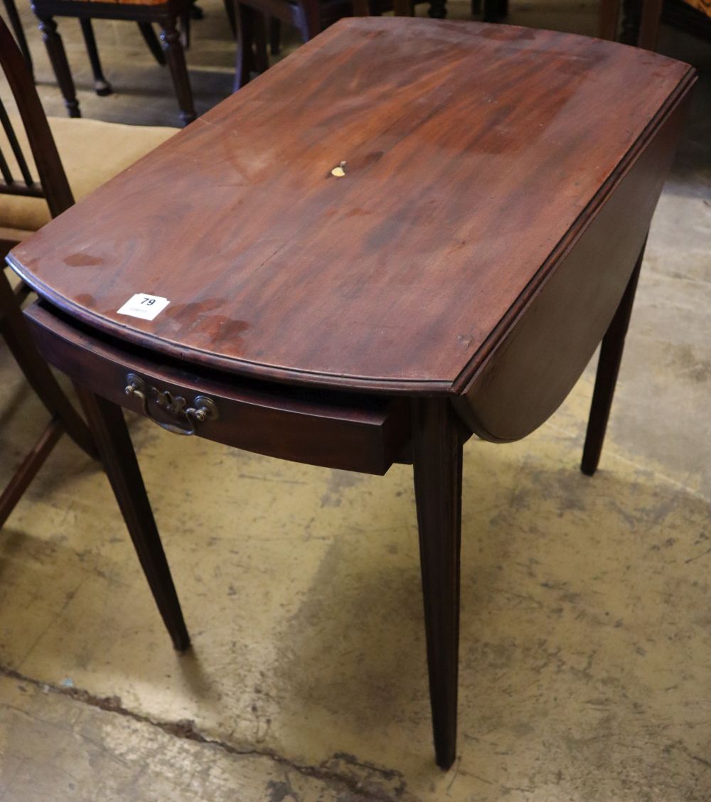 A George III mahogany Pembroke table, with oval top and moulded squared legs, width 77cm